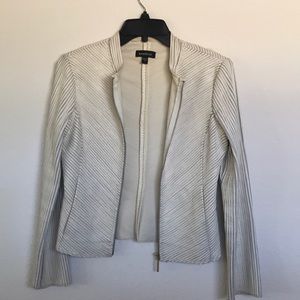 Cream fitted collarless leather jacket